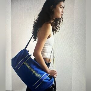Nwts FP Movement by Free People Good Sport duffle bag w/ adjustable strap;
